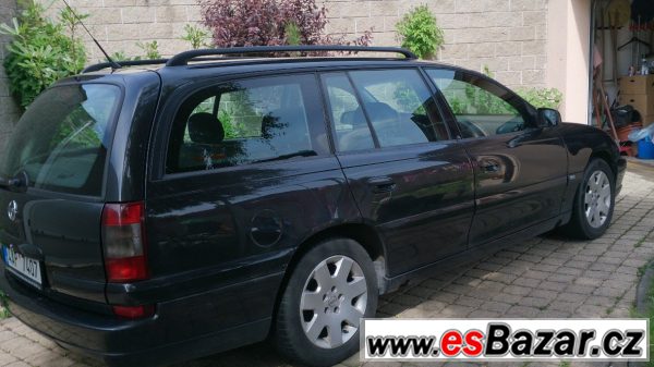 Opel Omega 2.6 V6 combi, spěchá! – fotografie 5
