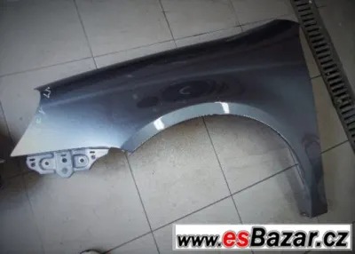 LEVÝ PŘEDNÍ BLATNÍK VOLKSWAGEN GOLF V COMBI ŠEDÝ