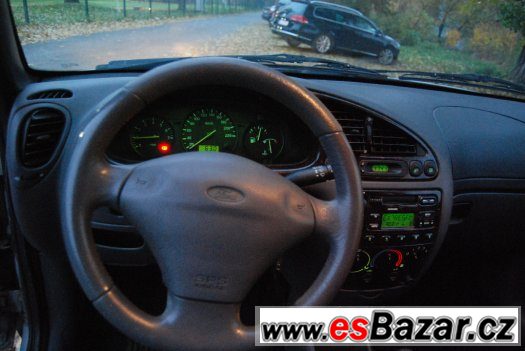 Ford Fiesta 1.4 16V + 2. sada kol v ceně – fotografie 3