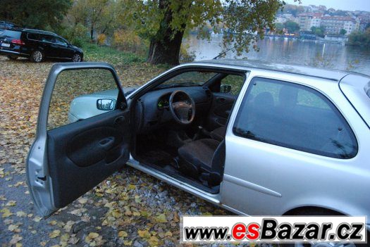 Ford Fiesta 1.4 16V + 2. sada kol v ceně – fotografie 4