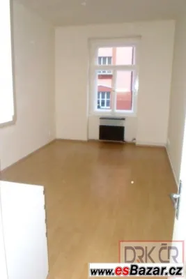 Nezařízená garsoniéra v dobrém stavu, vel. 22 m2,