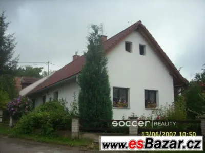Prodej rodinného domu 4+1 s garáží v obci Holovousy.