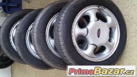 Pneumatiky a disky Ford + disky – fotografie 1