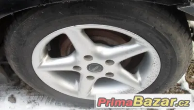BMW - hliníková letní kola 15" - pneu 70%
