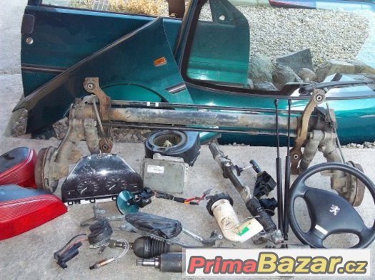Prodám náhradní díly Peugeot 106.,r. v. 2000, zelené barvy – fotografie 1
