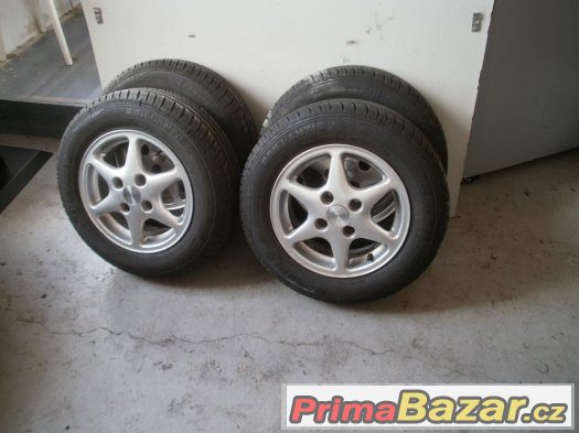 Prodám alu kola  Renault pneu letní Barum 165/70-13 stav 99% – fotografie 2