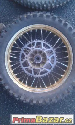 SUZUKI DR 350 Kola, Plasty, Ladena koncovka vyfuku a dalsi