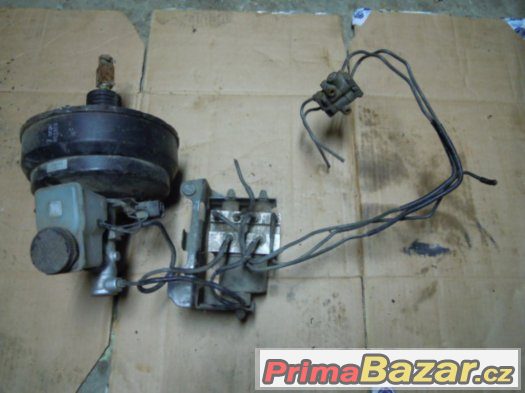Mazda 323 BJ, r.v. 98 - 03 - posilovač brzd s ABS čerpadlem – fotografie 1