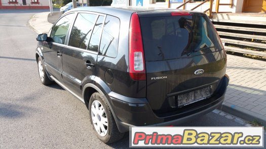 Ford Fusion 1.4i, model 2009 poskozeny PP bok – fotografie 3