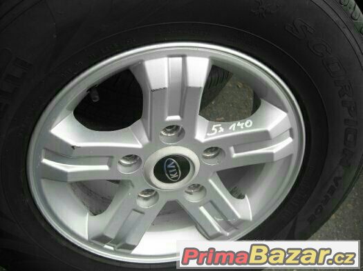 16" alu kola 5x139,7 KIA VČETNĚ PNEU 245/70/16 STAV 99% – fotografie 1