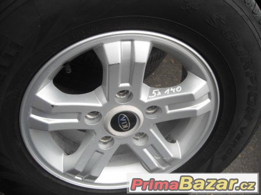 16" alu kola 5x139,7 KIA VČETNĚ PNEU 245/70/16 STAV 99% – fotografie 1