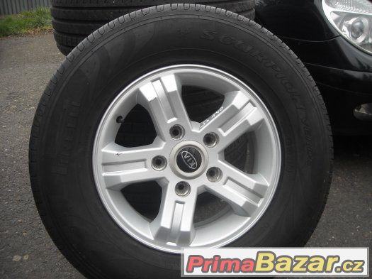 16" alu kola 5x139,7 KIA VČETNĚ PNEU 245/70/16 STAV 99% – fotografie 2