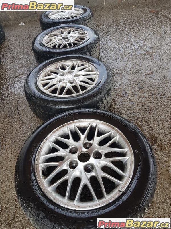 sada alu kola s pneu Mazda 5x114.3 6jx15