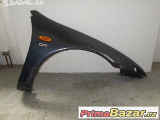 Mazda 323 F 94-97 pravý přední blatník – fotografie 1