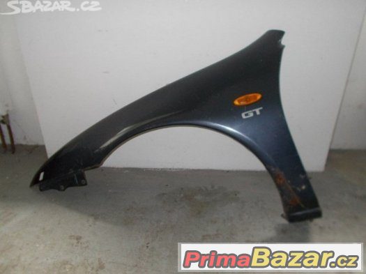 Mazda 323 F 94-97 levý přední blatník – fotografie 1
